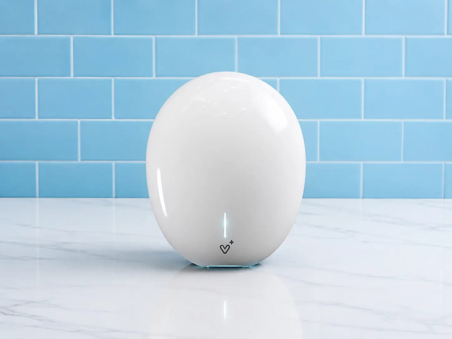 Velair Pebble hand dryer mounted in a washroom